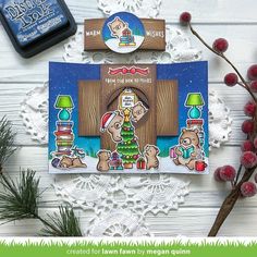 a christmas card with an image of a teddy bear and other holiday decorations on it