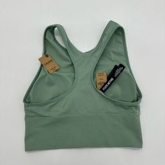 Sage Green, Soft And Stretchy. Very Light Fabric, Great For Working Out Or Everyday Wear Pet Friendly Smoke Free Home Casual Seamless Tank Top For Sports, Casual Green Sports Bra With Built-in Bra, Green Sportswear Tops With Light Support, Green Seamless Top For Gym, Green Seamless Tops For Training, Supportive Seamless Casual Top, Casual Supportive Seamless Top, Casual Medium Support Crop Top For Training, Casual Seamless Racerback Sports Bra