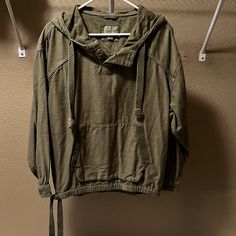 American Eagle Army Green Hoodie In Size Large. Kind Of A Lighter Denim Material. Button Detail On The Neckline And Ties On The Sides By The Hips. No Stains Or Rips In The Fabric. Only Worn Once Or Twice So It's Still In Excellent Condition. Items Come From A Very Pet Friendly Home! I Try My Best But There May Still Be Some Hair On The Garment. A Quick Wash And Lint Roll Once You Receive The Item Should Solve The Problem. All Items Come From A Smoke Free Home! All Items Are Laundered Prior To Sh Spring Hooded Washed Top, Spring Washed Hooded Top, Washed Cotton Hoodie Top, Casual Khaki Cotton Sweatshirt, Casual Khaki Cotton Hoodie, Casual Cotton Khaki Hoodie, Khaki Drawstring Hood Top For Fall, Casual Long Sleeve Washed Hoodie, Casual Washed Hoodie For Fall