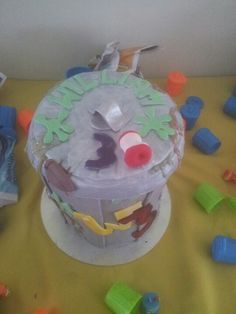 a birthday cake with frosting and decorations