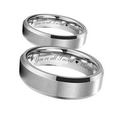 two wedding rings with the words you're all i need