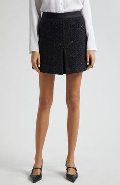 Metallic threads add sparkle and shine to this wool-blend tweed miniskirt perfected with crisp pleats and an A-line silhouette. Hidden side-zip closure Decorative flap pockets Lined 36% virgin wool, 35% polyester, 28% polyamide, 1% acrylic with 100% polyester contrast Dry clean Imported Fitted Tweed Mini Skirt For Party, Formal Tweed Mini Skirt, Elegant Tweed Mini Skirt With Lining, Elegant Tweed Lined Mini Skirt, Elegant Tweed Pleated Skirt, Elegant Mini Tweed Dress, Party Tweed Mini Skirt, Elegant Tweed Mini Bottoms, Chic Party Tweed Mini Skirt