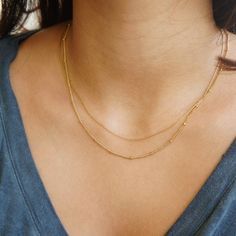 Layered Gold Double Chain Necklace, Dainty Necklaces for Her, Layered Gold Chains, Minimalist Jewelry, Gift For Her An elegant fusion of delicacy and modern elegance, this double layered chain necklace is a harmonious blend of minimalism and style. Two dainty chains come together to create a chic and versatile accessory that effortlessly elevates any outfit. With its understated charm, this necklace is perfect for both casual everyday wear and special occasions. Embrace the trend of layering jew Necklaces For Her, Minimalist Necklace Gold, Dainty Necklaces, Double Chain Necklace, Layered Chain Necklace, Layered Chain, Double Chain, Layered Jewelry, Necklace Dainty