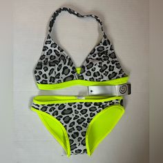 Brand New! Glide Soul Bikini. Both Top And Bottom Are Size Medium. Top Is Halter Style. Fabric Is Like A Light Neoprene, 0.5mm. Very Flexible And Smooth, With Stretch. Gray Animal Print With Neon Yellow Accents. On The Tag, It’s Called: Leopard/Lemon Questions And Offers Welcome! Please Check Out The Rest Of My Closet - I Offer Additional Discounts On Bundles. Neon Yellow Stretch Sleeveless Swimwear, Neon Yellow Stretch Swimwear For Swimming, Neon Yellow Stretch Swimwear, Yellow Summer Swimwear For Sports, Yellow Summer Sports Swimwear, Casual Yellow Halter Neck Swimwear, Neon Yellow Fitted Triangle Top Swimwear, Fitted Neon Yellow Triangle Top Swimwear, Trendy Neon Yellow Swimwear