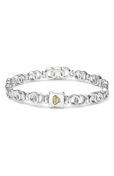 A pavé diamond–adorned center link brings fiery sparkle to this stunning bracelet crafted from interlocking circles made of 18-karat gold and sterling silver. Push-clasp closure Total diamond weight: 0.18ct. Color: G–H Clarity: SI Sterling silver/18k gold/diamond Imported >Diamond Guide Anniversary White Gold Bracelet With Solid Link Construction, Anniversary White Gold Bracelet With Solid Link, Anniversary White Gold Bracelet, Diamond Guide, Bracelet Crafts, Anniversary Sale, Pave Diamonds, G H, Link Bracelets