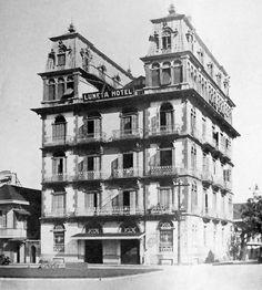 an old black and white photo of a hotel