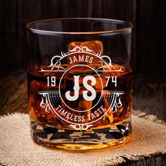 a whiskey glass with the name james's on it