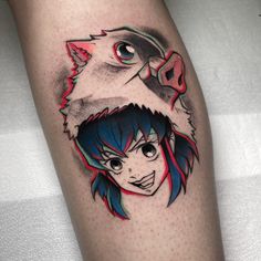 a woman's leg with an anime character tattoo on the side of her thigh