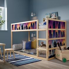 a child's bedroom with bunk beds and toys on the floor in front of it