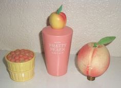 three different types of fruit are sitting on a table next to a cup and container