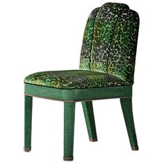 an upholstered green chair with leopard print on the back and seat, against a white background