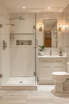 a bathroom with a toilet, sink and shower stall in the middle of the room