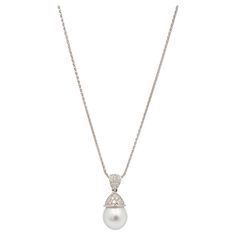 Brand: Mikimoto Gender: Ladies Metal Type: Platinum Pendant Length: 1.00 Inches Chain Length: 17.50 Inches Pendant Diameter: 12.00 mm Chain Width: 1.25 mm Pendant Weight: 5.36 grams Chain Weight: 5.65 grams 950 platinum diamond and pearl drop pendant. The metal was tested and determined to be 950 platinum. Engraved with "PT950". The "Mikimoto" trademark (or hallmark) can also be found on the item. 950 platinum wheat link chain. The metal was tested and determined to be 950 platinum. Engraved wit Luxury White Pearl Pendant Necklace, Luxury Diamond White Jewelry With Pearl Pendant, Luxury White Pearl Pendant Jewelry, Mikimoto Pearls Earrings Diamonds, Mikimoto Pearls Necklace, Platinum Pendant, Pearl Diamond Pendant, Pearl Drop Pendant, Japanese Pearls