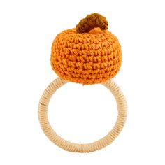 an orange crocheted ring with a wooden bead on the front and bottom