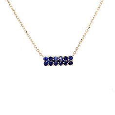 Precious Bar Necklace by Kury - Available at SHOPKURY.COM. Free Shipping on orders over $200. Trusted jewelers since 1965 Sapphire Jewelry Necklace, Scapular Necklace, Jewelry Rendering, Emerald Blue, 14k Yellow Gold Necklace, Baby Earrings, Yellow Gold Necklace, Necklace Craft, Necklace Brands