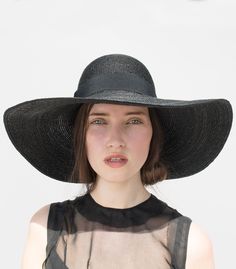 "Emanuelle" not only provides the absolute WOW effect with a wide curved hat brim, but also good protection against too much sun. The material is sunproof, yet remains airy. The look is classic, simple and elegant. Thanks to a high, round headpiece, the summer hat fits perfectly, whether on the beach or when strolling through town. Lightweight and very flexible, it is extremely comfortable to wear. The production of a raw hat from "wheat straw mottleds" is very complex. A braided wheat straw bor Stylish Winter Hats, Wheat Straw, Summer Hats For Women, Wide Brimmed, Summer Hats, Hat Sizes, Elegant Woman, Grosgrain Ribbon, Hat Designs