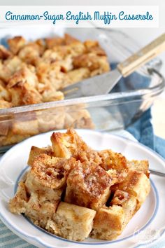 cinnamon - sugar english muffin casserole on a plate with a serving dish in the background