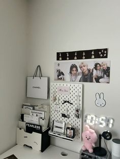 a white desk topped with lots of boxes