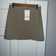 Brand New, Never Worn! Zara Beige Colored Straight Mini Skirt Zara Beige Skirt For Workwear, Zara Beige Skirt For Work, Zara Beige Workwear Skirt, Fitted Beige Mini Skirt By Zara, Zara Fitted Beige Mini Skirt, Zara Brown Casual Mini Skirt, Fitted Brown Zara Skirt, Zara Brown Mini Skirt, Zara Cotton Lined Mini Skirt