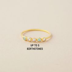 "♥ Family Birthstone Ring ♥ Customed by kids' birthstones, this beautiful and dainty ring is a perfect gift for your mom or your loved one. P R O D U C T ∙ I N F O * Material: Solid 925 Sterling Silver * Finishing: Silver - Yellow Gold - Rose Gold * Up to 5 stones * Each stone measures approx. 1/16'' (2mm) H O W * T O * O R D E R 1. Select the drop-down option you want 2. Please let us know the following information in the \"Add your personalization\" box or \"Note to Seller\" box: - The birthst Stackable Rings With May Birthstone For Birthday, May Birthstone Ring With Bezel Setting, Stackable May Birthstone Ring For Birthday, May Birthstone Stackable Ring For Birthday, Stackable Round Birthstone Ring For Birthday, Dainty Birthstone Ring With Bezel Setting For Anniversary, Dainty May Birthstone Ring With Bezel Setting, Dainty Gemstone Rings For Birthday, Dainty Anniversary Birthstone Ring With Bezel Setting