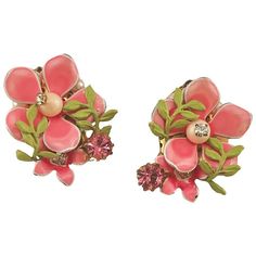 "Vintage Pink Enamel Flower Earrings with Faux Pearl and Rhinestone with Clip on Backs. What I find incredible about these earrings is that if you turn them over on the backs, you can see a row of faux pearls. They would be visible only at the side of the ear, not at the front. I think that takes a lot of thought to add that detail. The row of faux pearls is hand wired and glued for security. The large pink rhinestones are prong set. ITEM ID: RL-J588 COLOR: Cream, Green, Pink STYLE: Mid-Century Pink Flower-shaped Clip-on Earrings, Pink Flower Clip-on Earrings, Pink Flower-shaped Enamel Earrings, Pink Flower Enamel Earrings, Pink Enamel Flower-shaped Earrings, Pink Enamel, Pink Style, Floral Fashion, Flower Accessories