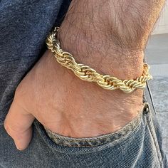 Express your bold attitude with this Men's 14k Gold Plated Twisted Rope Chain Bracelet by Bling Cartel. Perfect for any occasion, this 10MM thick piece is sure to catch everyone's attention. The lobster clasp ensures a secure fit. #MensJewelry #HipHopJewelry #MensBracelet #BlingCartel #RopeBracelet #Bracelet #GoldBracelet #HipHopBracelet # #eBayStore Rope Chain Bracelet Men, Adjustable Gold Curb Chain Jewelry, Gold Rope Chain Bracelet, Metal Link Rope Chain Jewelry, Classic Gold Bracelets With Rope Chain, Classic Rope Chain Bracelet Jewelry, Adjustable Gold Rope Chain Bracelet, Elegant Gold Bracelet With Rope Chain, Classic Gold Bracelet With Rope Chain