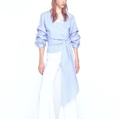 Love Pleats On Sleeves.. Fine Blue Striped Background With Dot Pattern...Wrap Style With Bow Very Dramatic And Sexy... Pair With Jeans Or Trousers Light Blue V-neck Blouse For Daywear, Elegant Wrap Top For Brunch, Wrap Blouse For Day Out, Elegant Spring Wrap Top, Cotton Long Sleeve Wrap Top For Summer, Chic Spring Wrap Top, Chic Wrap Top For Spring Day Out, Chic Wrap Top For Brunch, Spring Cotton Long Sleeve Wrap Top