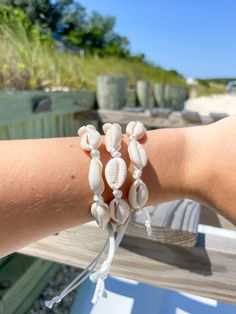 Cowrie shell adjustable bracelet Coastal Style Bracelet Jewelry For Vacation, Coastal Beach Bracelet Jewelry, Shell Bracelet Jewelry For Beach, Adjustable Beaded Braided Bracelets For Vacation, Adjustable Jewelry For Vacation, Adjustable Vacation Jewelry, Coastal Style Vacation Bracelet Jewelry, Shell Bracelet Jewelry For Vacation, Handmade Adjustable Bracelets For Beach