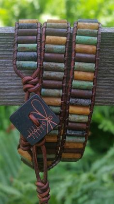 A triple wrap leather bracelet for Summer 2016! Chocolate brown distressed rustic leather, matte picasso Czech glass bugle beads, and a sweet little Firefly copper square button come together in harmony. Fun. Summer. Earthy. Hippie...need I say more Brown Bohemian Rectangular Bracelet, Brown Rectangular Bohemian Bracelet, Bohemian Brown Rectangular Bracelet, Brown Bohemian Leather Bracelet For Everyday Use, Brown Bohemian Leather Bracelet For Everyday, Bohemian Brown Leather Bracelet For Everyday Use, Handmade Rustic Wrap Bracelet, Brown Adjustable Wrap Bracelet For Everyday, Bohemian Hand Wrapped Brown Leather Bracelet