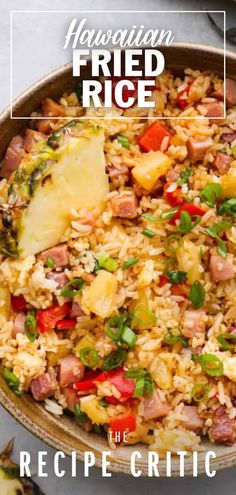 hawaiian fried rice with ham and pineapples in a skillet