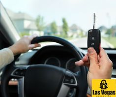 a person holding a cell phone in their hand while sitting in a car with the steering wheel behind them