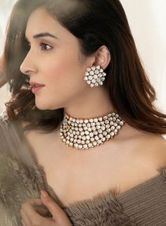 Hey, Welcome to our shop! Gorgeous Glowing and sparkling luxury Bollywood inspired jewelry set with studded diamonds and colorful stones, adding a royal touch to complete your look for your special occasion! It would be the perfect jewelry set for you chic brides and your bridesmaids, or any contemporary trendsetter looking for those traditional vibes, but still want to be the most fabulous ladies at any party.  < 1 DAY ITEM SHIPMENT | 7-8 Days Delivery TIME> About our Jewellery - Classic, Brill Ad Diamond Necklace Set, Jewel Wedding Necklace, Cubic Zirconia Kundan Necklace For Wedding, Dazzling Jewelry Sets For Reception, Dazzling Jewelry Sets For Festive Party, Cubic Zirconia Jewels Jewelry Sets For Celebration, Cubic Zirconia Jeweled Jewelry Sets For Celebration, Cubic Zirconia Jewelry Sets For Celebration, White Jeweled Jewelry In Cubic Zirconia