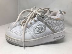 Women's Heelys Fantasia  Skate Shoes with Silver Stars US Size: YTH 3 UK Size: UK 2 EU Size: EU 34 Color: White and Silver Stars Model: 7389 Made in Indonesia Listing and template services provided by inkFrog Cute Shoes With Stars, White Cute Shoes, Y2k Star Shoes, White Aesthetic Shoes, 2000’s Shoes, White Shoes With Star, Cybercore Shoes, Cute White Shoes, Heelys Shoes