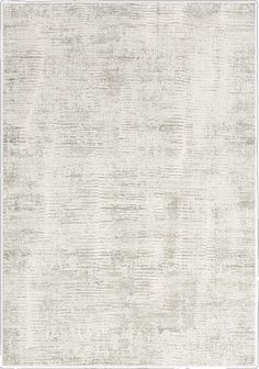 an area rug with white and gray colors