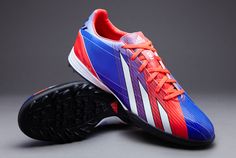 the adidas soccer shoe is shown in red, white and blue