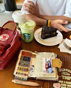 a person sitting at a table with some food