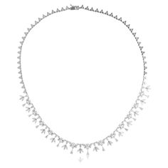 It sounds like we're describing a necklace made from 18 karat white gold, featuring a combination of round, pear-shaped, and marquise diamonds with a total weight of 8.20 carats. This necklace is categorized as fine jewelry due to the use of high-quality materials and precious gemstones. The description suggests a design where the necklace likely incorporates various diamond shapes arranged in a harmonious pattern. Each shape—round, pear, and marquise—has its own unique appeal, and combining the Luxury White Gold Pear Shaped Diamond Necklace, Luxury Marquise Necklace With Diamond Eyes, Luxury Diamond White Marquise Cut Diamond Necklace, Fine Jewelry Pear-shaped Diamond White Necklace, Luxury Marquise Diamond White Necklace, Luxury White Gold Diamond-shaped Necklace, Luxury White Diamond-shaped Necklace, Teardrop Diamond, Big Diamond