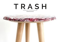 a stool with the words trash on it and an image of a flowered seat