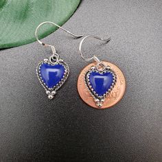 Visit our on-line shop at: Etsy.com/shop/AlbuquerqueDesigns *sterling silver earrings *dangles / drops / ear wires / hooks *southwestern jewelry *blue lapis lazuli *calibrated pre-cut stones: 10x10mm heart shape *back of jewelry items are all covered / do not show the back of stones *all jewelry items are made to ship, slight variations in stones will occur comparing to pictures. *size of a penny is 19mm or a dime is 18mm in diameter for comparing size with jewelry items. *handcrafted in USA *fr Valentine's Day Blue Heart Earrings, Sterling Silver Heart Beads Dangle Earrings, Blue Heart Beads Jewelry For Anniversary, Blue Heart Cut Earrings For Valentine's Day, Blue Elegant Heart Earrings For Pierced Ears, Blue Earrings For Anniversary On Valentine's Day, Blue Heart Earrings For Gift, Elegant Blue Heart Earrings For Pierced Ears, Blue Handmade Heart Drop Earrings