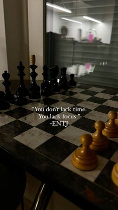 a chess board with the words you don't lack time you lack focus - ent