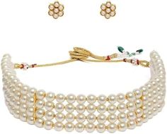 Enhance your traditional look with the Gold Tone Ethnic Multistrand Pearls Choker Necklace & Earring Set for Women. This elegant set is perfect for weddings, parties, and special occasions, offering a blend of tradition and modern style. It also makes an ideal gift for any cultural celebration. Traditional Beaded Jewelry Sets, Beaded Jewelry Sets For Festivals, Festive Adjustable White Necklace, Adjustable Round Beads Jewelry For Diwali, Adjustable Beaded Jewelry For Diwali, White Adjustable Temple Jewelry, Traditional Adjustable Jewelry Sets For Festive Occasions, Adjustable Temple Jewelry Sets For Festive Occasions, Festive Adjustable Temple Jewelry Sets