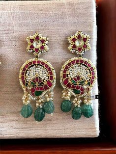 Elevate your bridal ensemble with our exquisite Pachi Kundan earrings, meticulously handcrafted to capture the essence of traditional Indian elegance. These stunning jhumka earrings are the perfect statement piece for your wedding day, exuding timeless charm and unique craftsmanship. Adorn yourself with these intricately designed treasures and make a dazzling statement that reflects your individuality and style. OCCASION: PARTY WEAR, WEDDING, MARRIAGES, CASUAL, DAILY WEAR Ideal Gift Idea: Perfec Earrings Indian, Kundan Earrings, Indian Earrings, Jhumka Earrings, Earrings Unique, Earrings Wedding, Memorable Gifts, Unique Earrings, Wedding Earrings