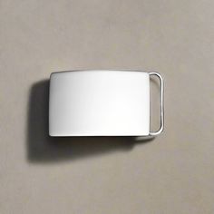 Our plain-finished sterling silver belt buckle is handcrafted in the United States. Made using 925/1000 silver, our sterling silver belt buckles are polished to a brilliant, shiny finish and plated with a layer of pure Rhodium for added durability and diminished tarnishing. This sterling silver plain belt buckle is suitable for engraving, and a range of personalized monogram styles or initial lettering fonts is available — there is no additional engraving charge. We offer two loop sizes, with th Silver Belt Buckle, Silver Belt, Silver Belts, Monogram Styles, Personalized Monogram, Lettering Fonts, Belt Buckle, Belt Buckles, The United States