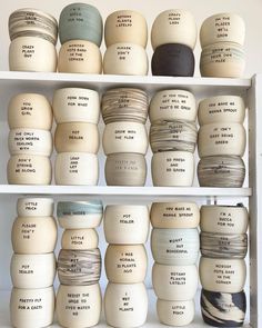 the shelves are filled with different types of jars