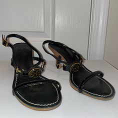 Size 7 Dust Bag Included Never Worn Black, Gold, And Wooden Heel Black Open Toe Heels With Gold-tone Hardware, Black Leather Sandals With Gold-tone Hardware, Formal Black Sandals With Gold-tone Hardware, Wooden Heel, Tory Burch Shoes, Wearing Black, Shoes Women Heels, Tory Burch, Dust Bag