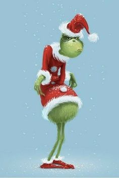 the grinch is wearing a santa hat and standing on one foot in the snow