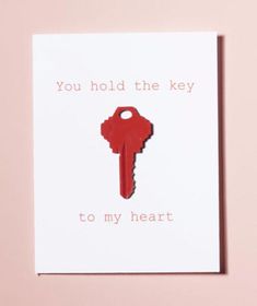 a card with the words you hold the key to my heart and a red key on it