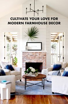 a living room filled with furniture and a fire place in front of a brick fireplace