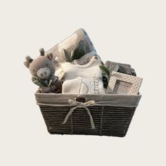 a basket filled with baby items on top of a table