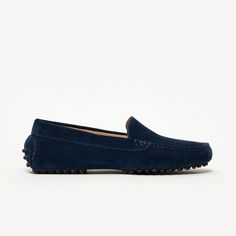 The Felize Suede - Suede Moccasin - Midnight Blue with Black Pegs - M.Gemi Timeless Suede Loafers With Round Toe, Luxury Moc Toe Moccasins For Driving, Luxury Moccasins With Moc Toe For Driving, Suede Driving Loafers With Rubber Sole, Elegant Driving Loafers With Moc Toe, Elegant Moc Toe Driving Loafers, Suede Slip-on Driving Moccasins, Suede Slip-on Moccasins For Driving, Suede Moccasins With Rubber Sole For Driving